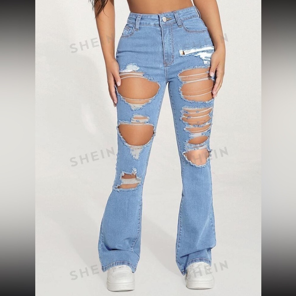 Shein high waisted ripped flared jeans in light wash blue. Size petite M/6